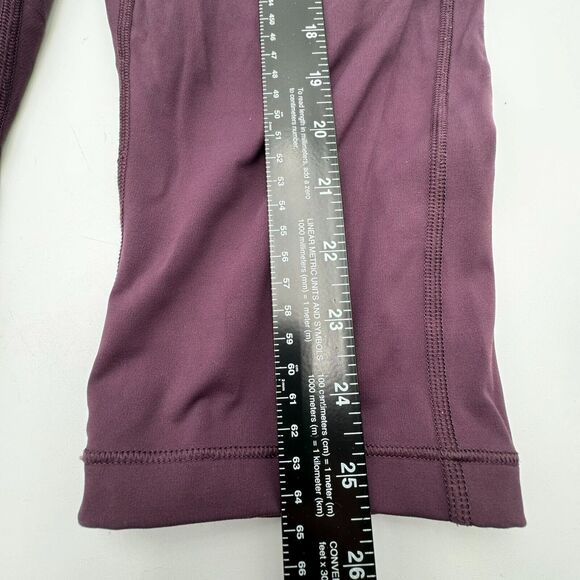 ATHLETA | Large Ultimate Stash Pocket Crop Compression High Rise Purple Leggings - Picture 4 of 9